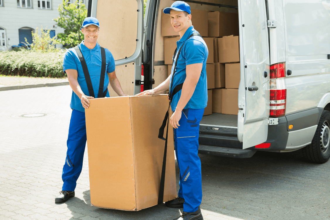 Two Movers Loading Boxes