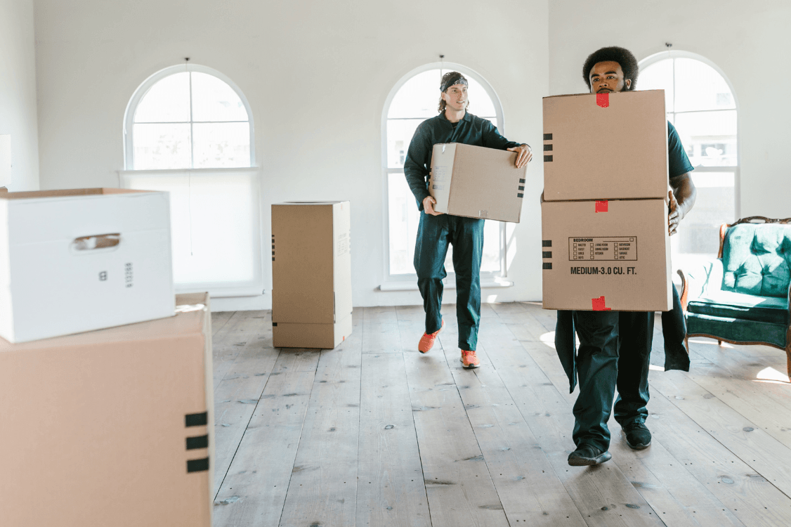 Men Carrying Boxes